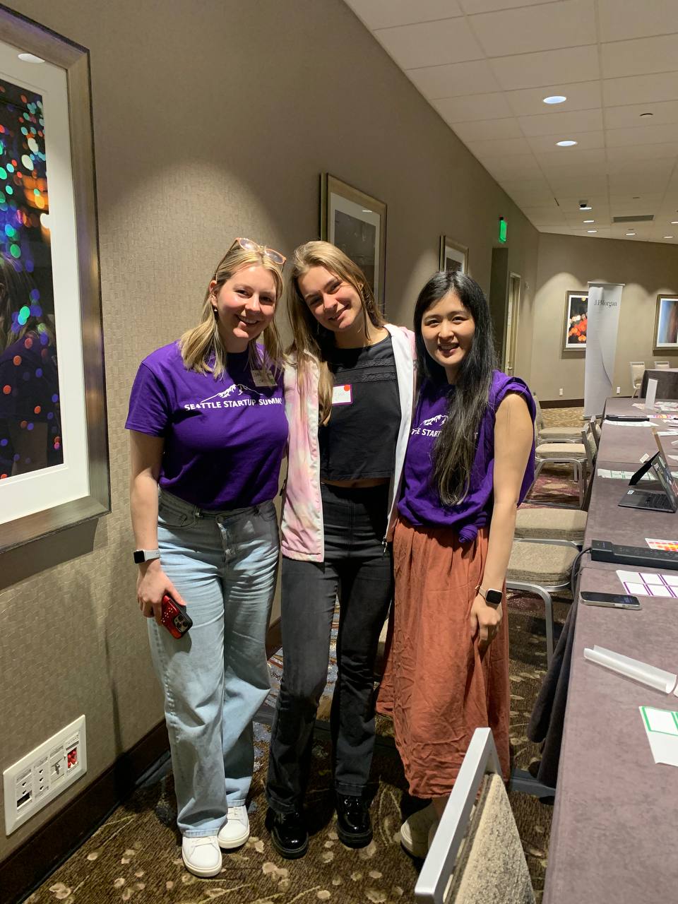 Seattle Startup Summit volunteers wearing the purple event T-shirts